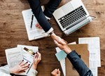 Business People Shaking Hands Together